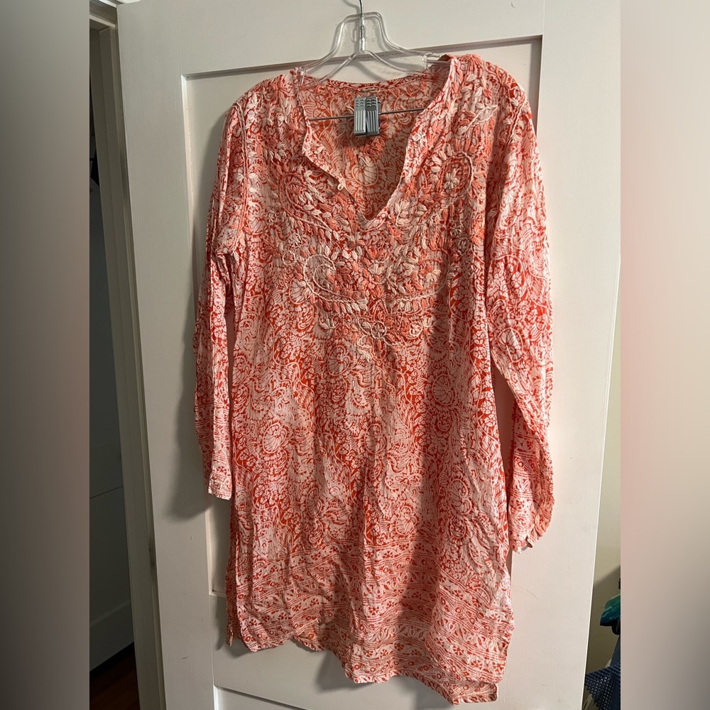 Women’s silk dress shirt.